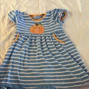 Blue and White Striped Dress with Pumpkin Design